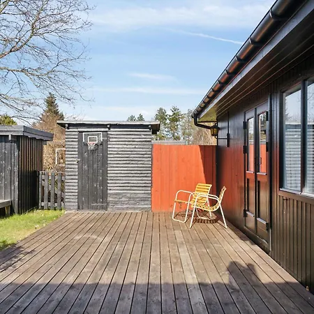 Holiday home Lovely In